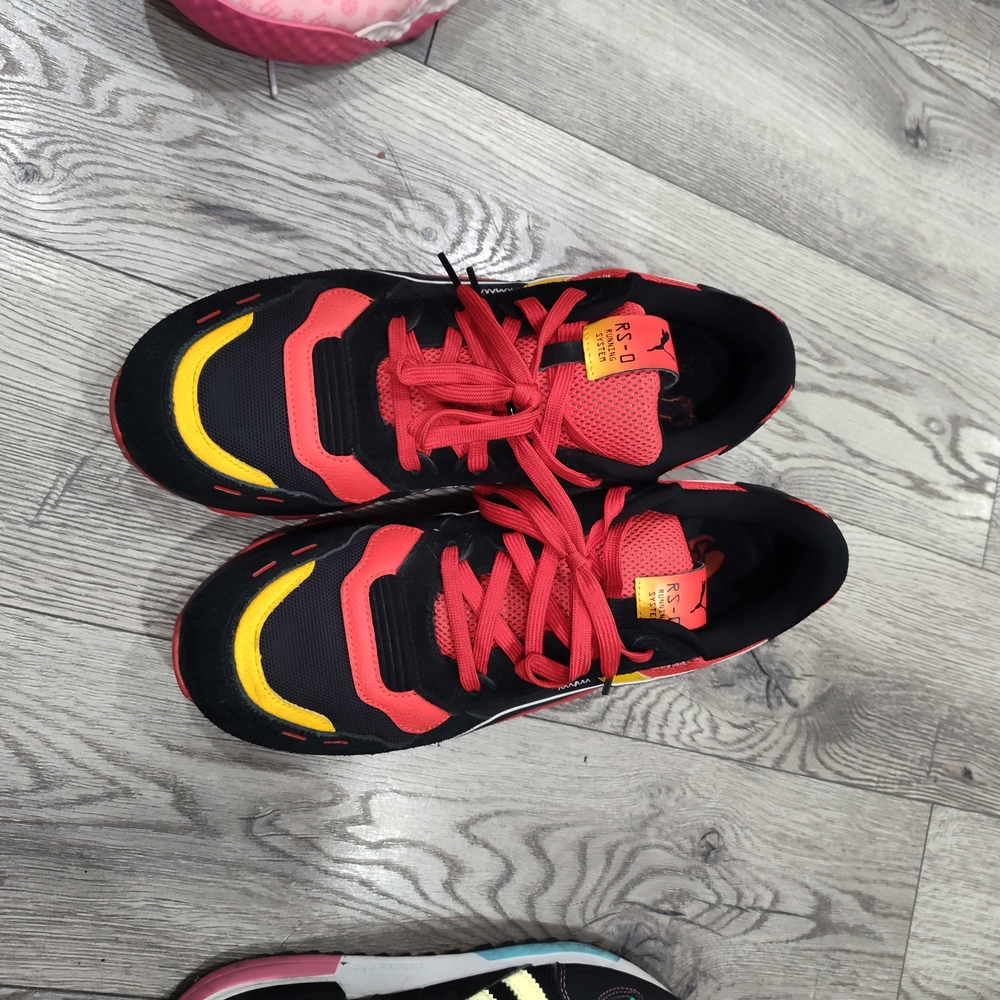 Puma Black and Red Athletic Shoes with Yellow Highlights